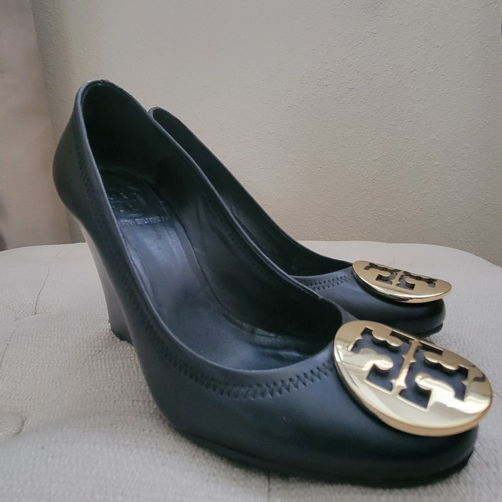 Black Leather Wedge Pumps with Gold Logo Medallion
